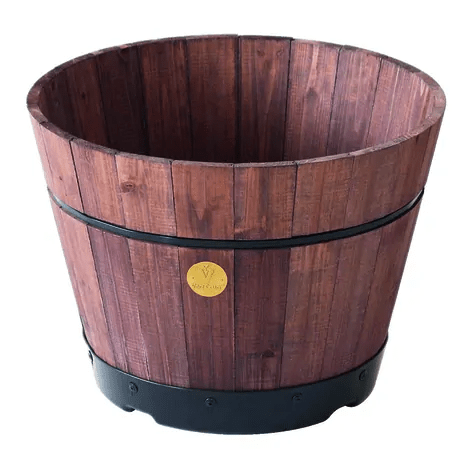 Wooden barrel kit with durable plastic base for garden and patio use. Perfect for planting, aeration, and drainage.